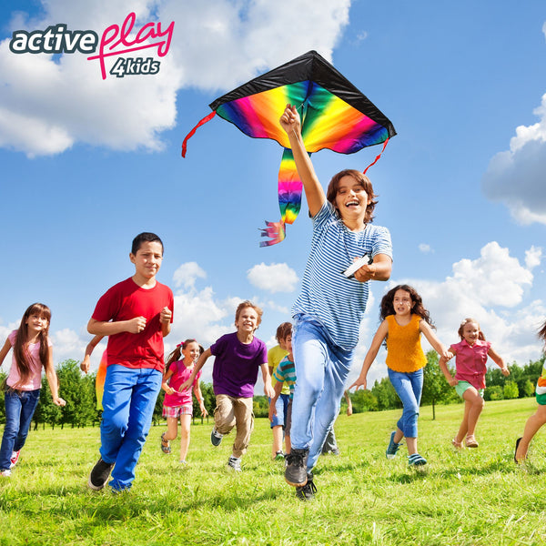 Group of kids running outside having fun flying their easy flyer kite