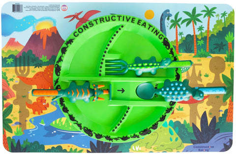 Dinosaur cutlery set on their place on the green Dinosaur Plate for kids with prehistoric placemat for kids