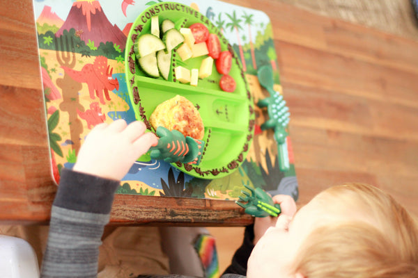 Children enjoy mealtime with this fun Dinosaur utensil set and plates for kids